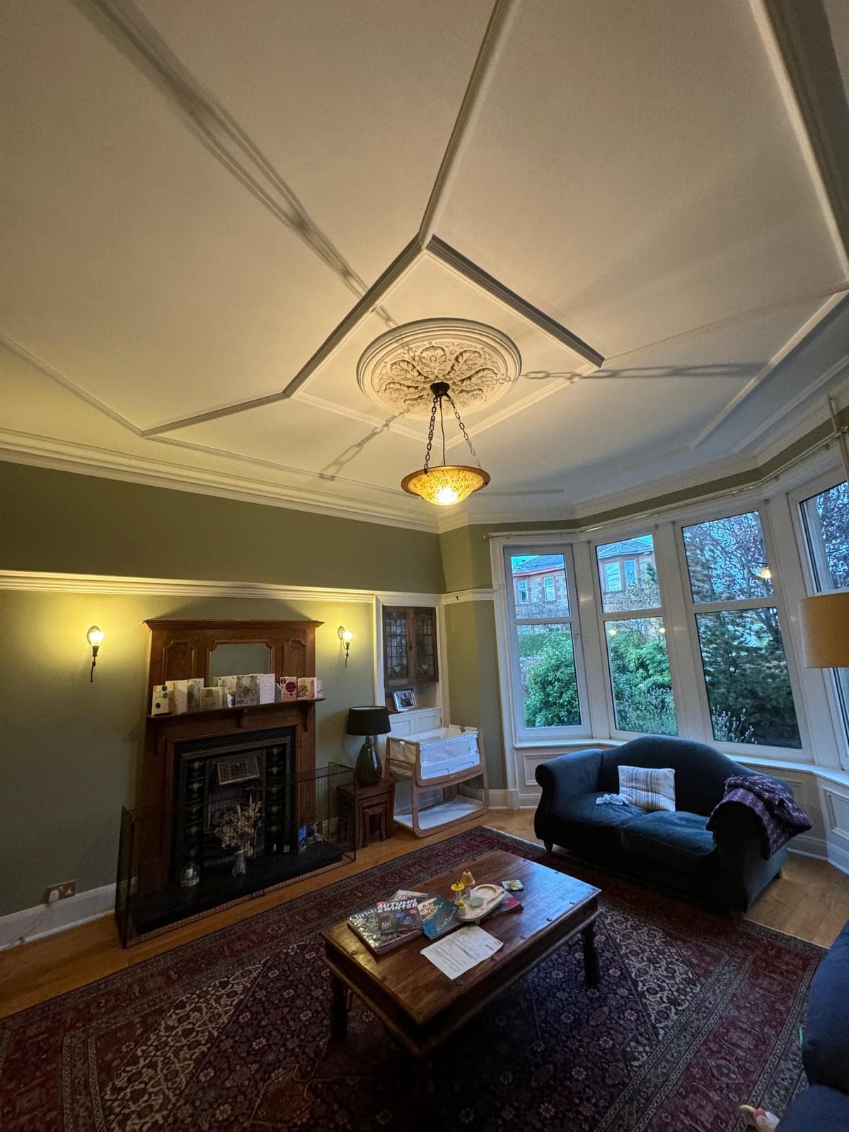 Finished living room with restored cornice and ceiling rose