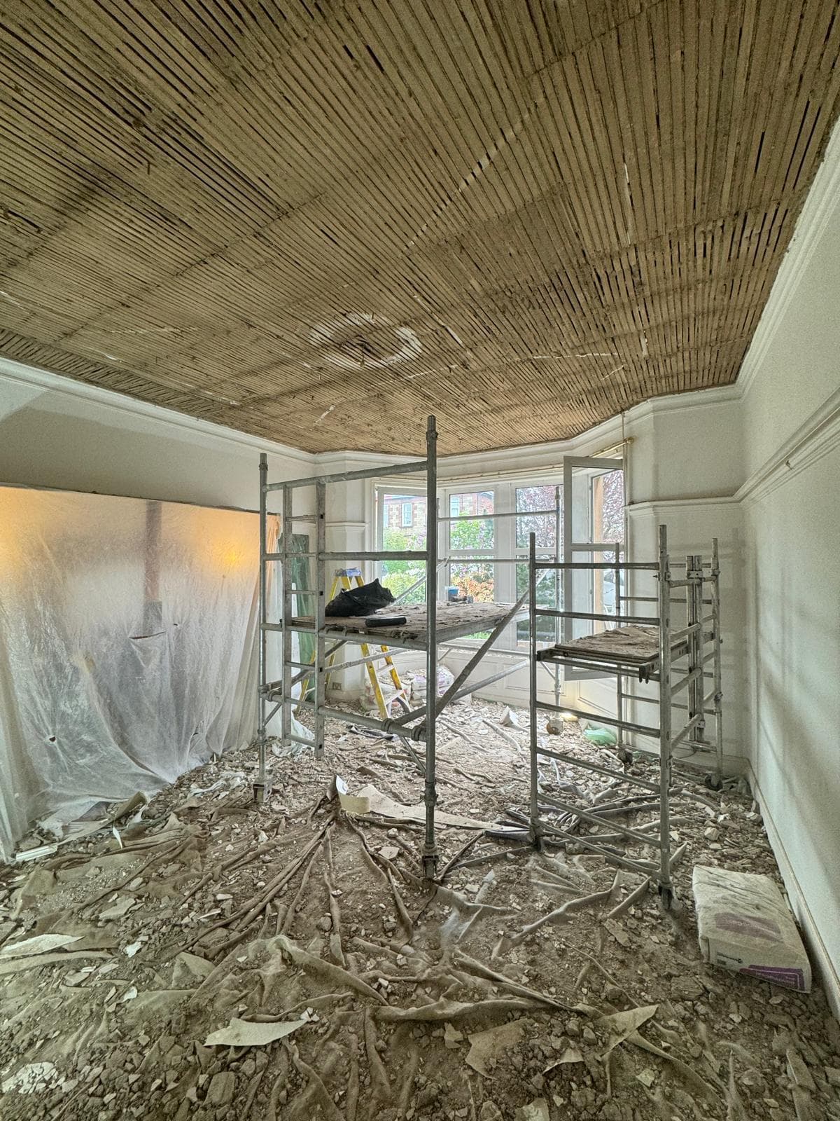 Ceiling laths exposed during plaster removal