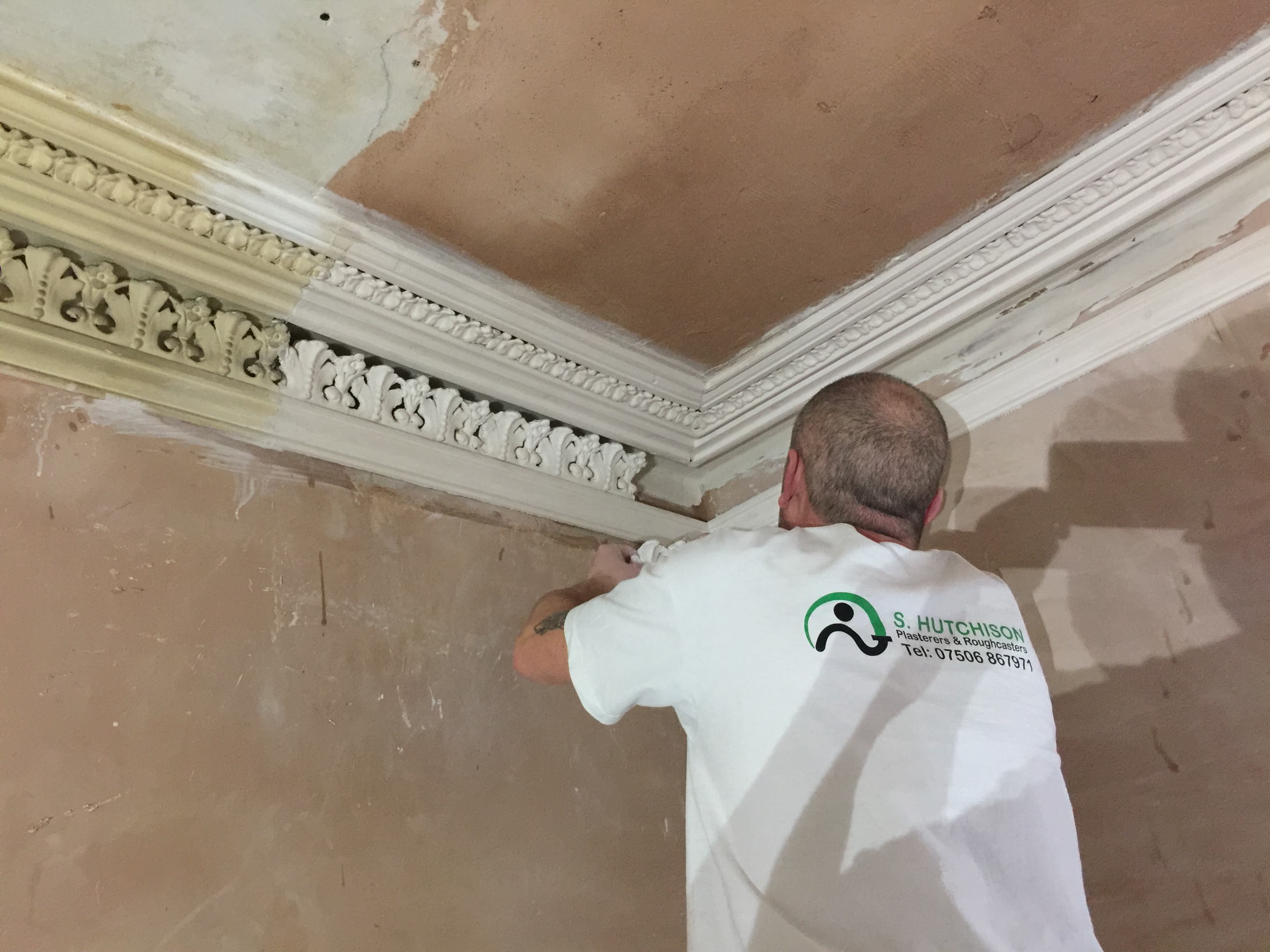 Ceiling plastering in a refurbished room