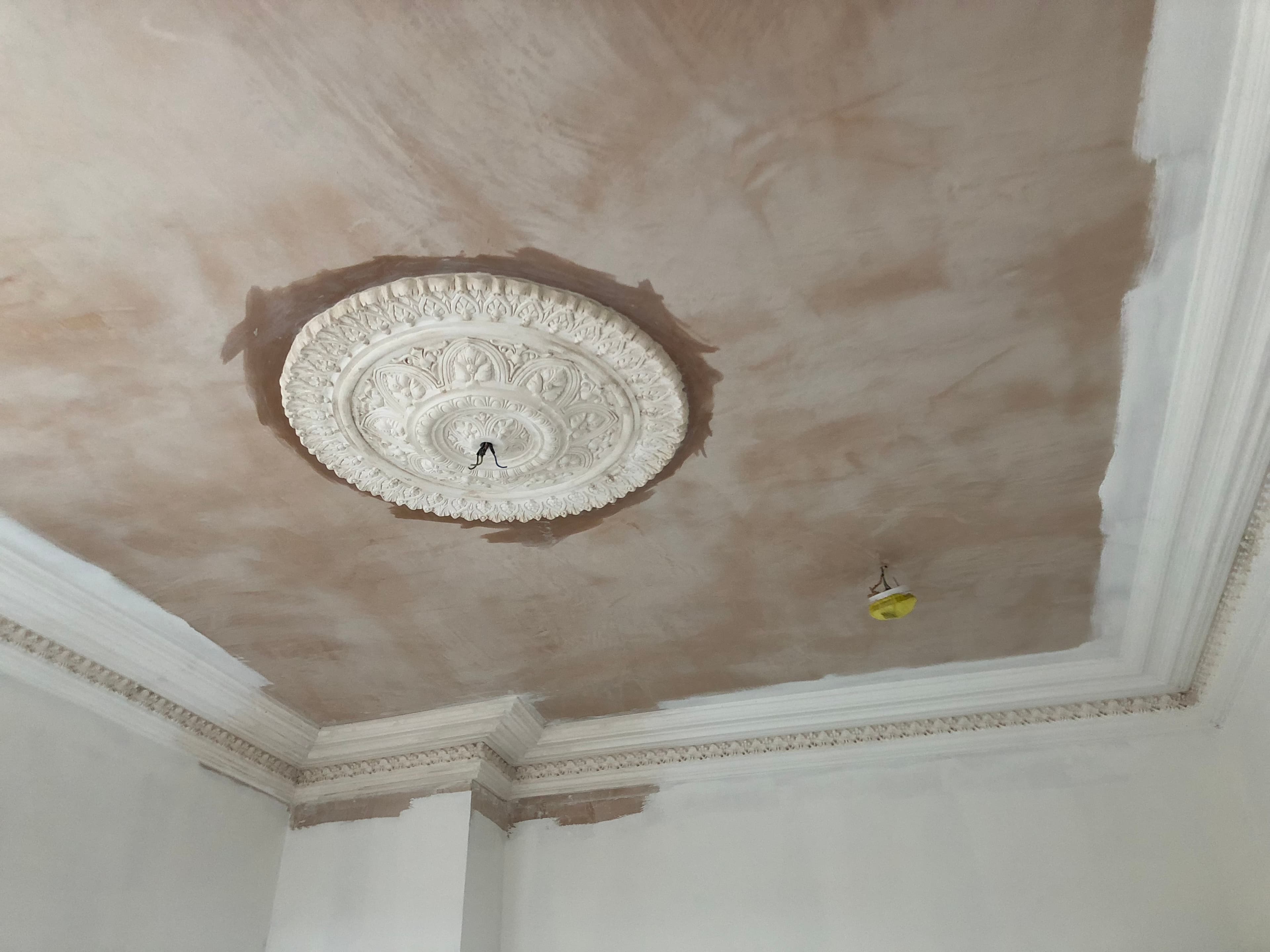 Coving fitted to a skimmed ceiling