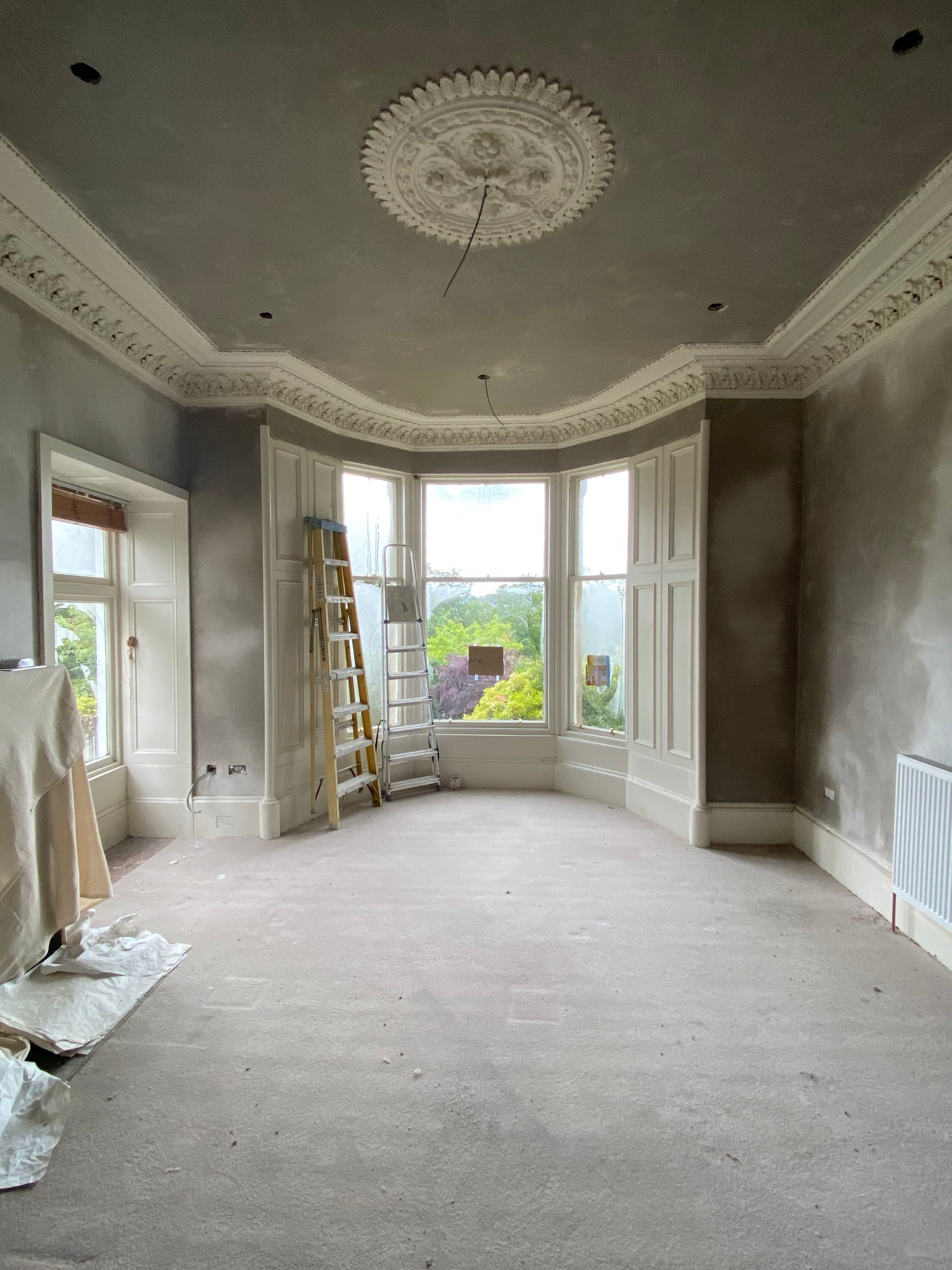 Restored ornamental cornice in a period room