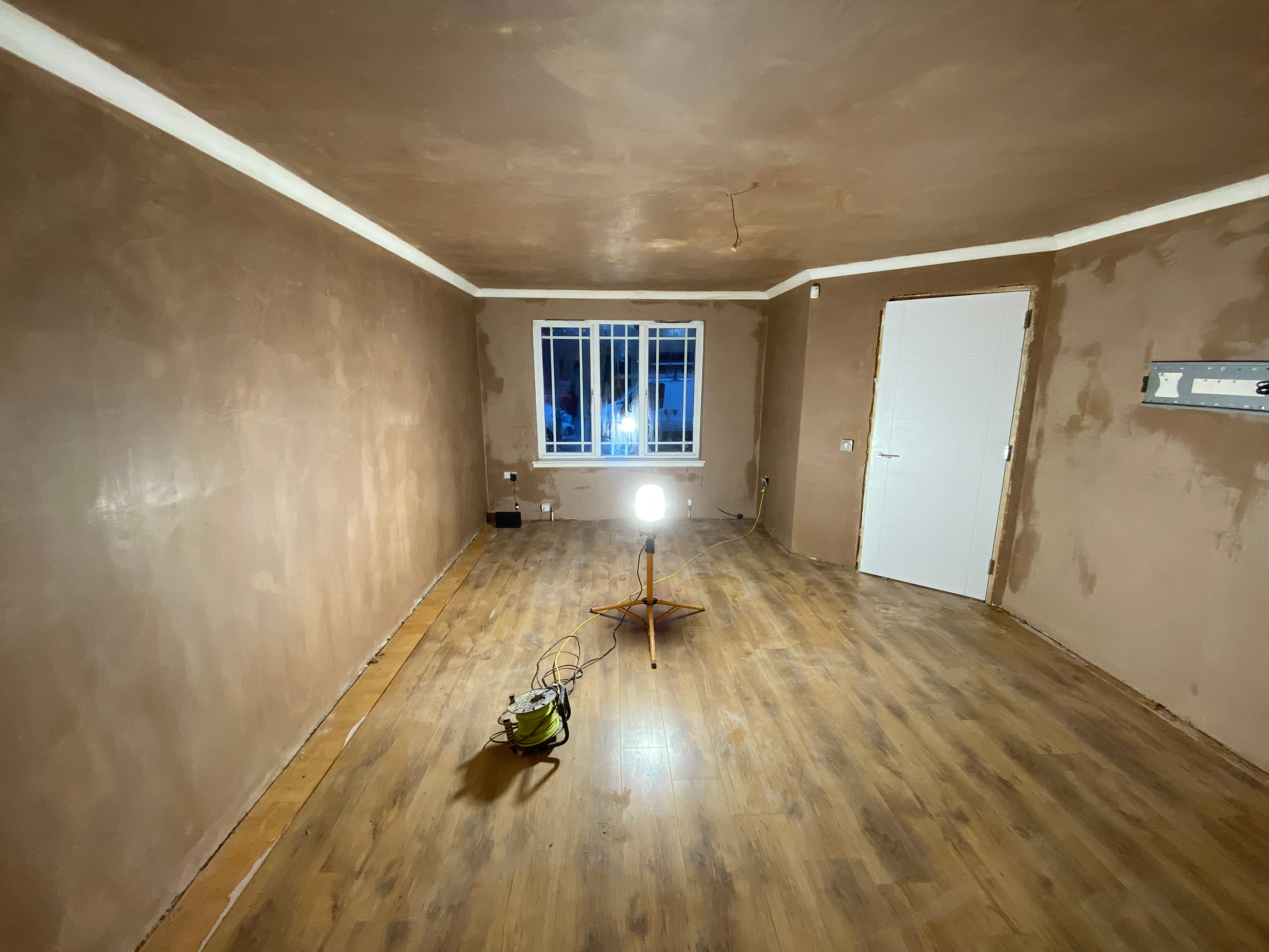 Smooth plaster finish on a partition wall