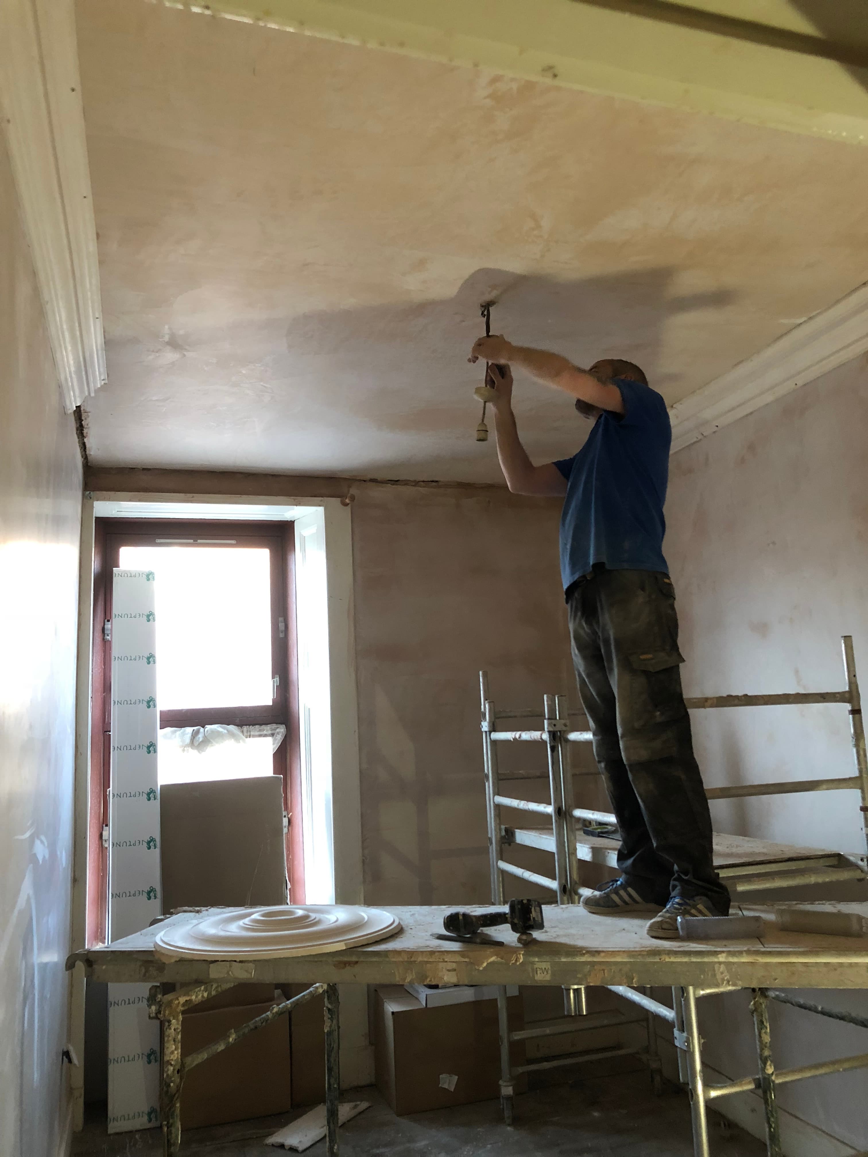 Finished skim on a hallway ceiling