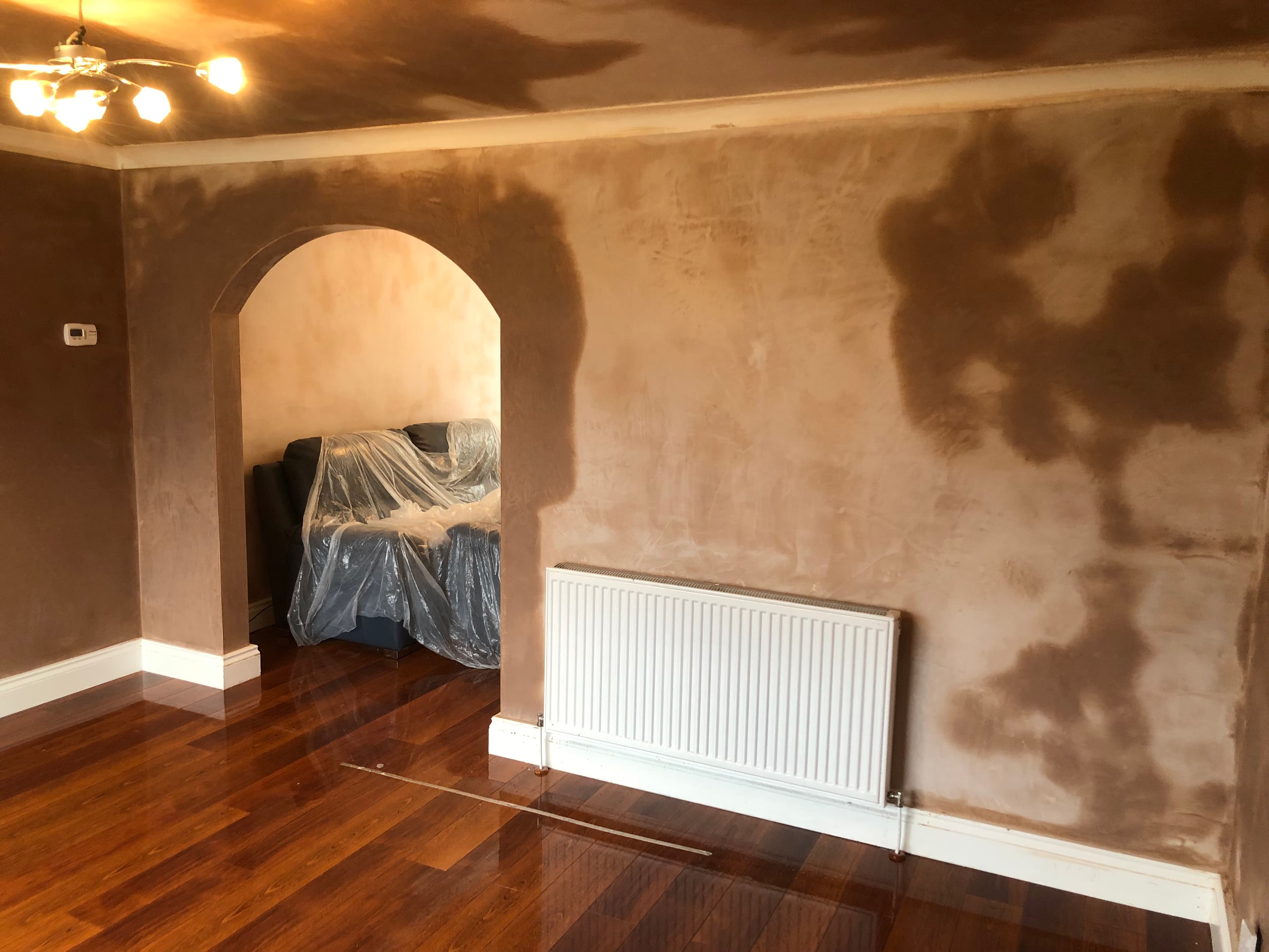 Kitchen wall plastered after a refit