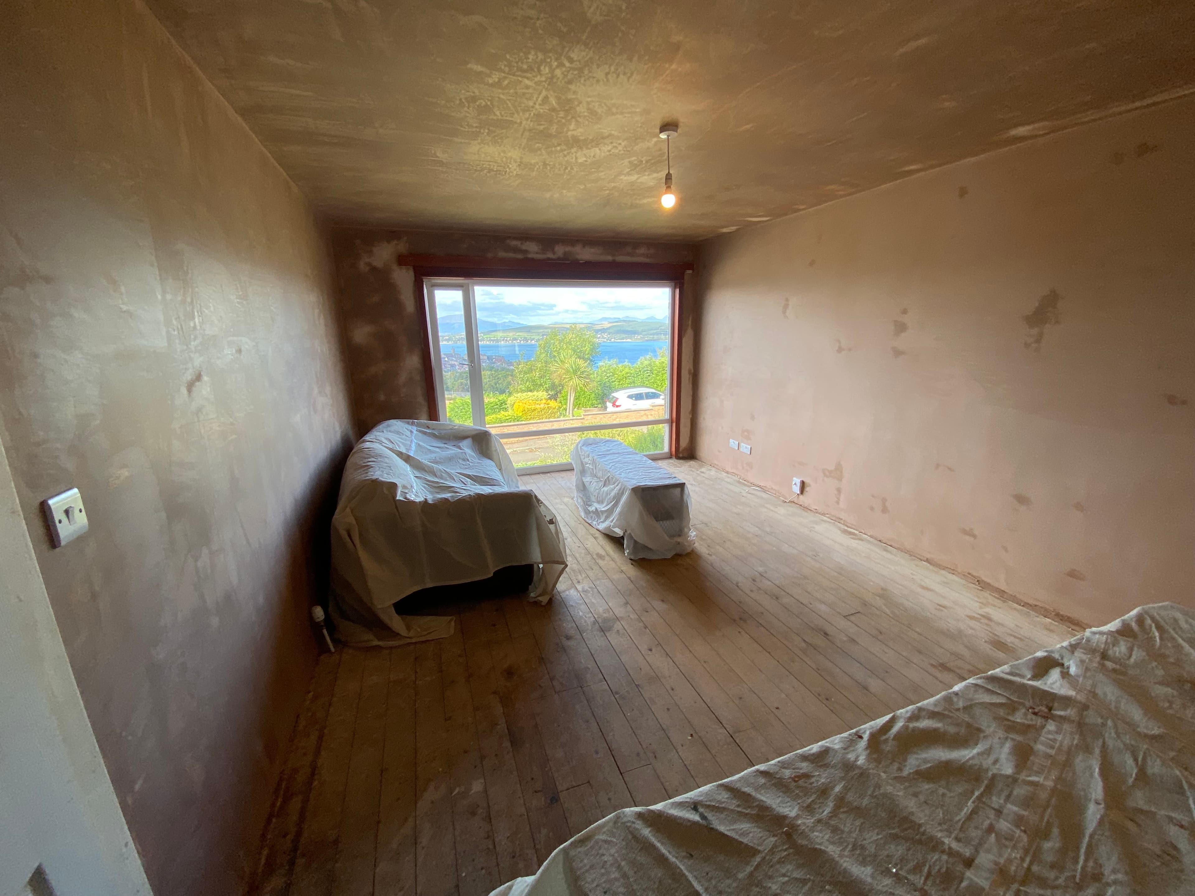 Stair wall plastered clean to the string