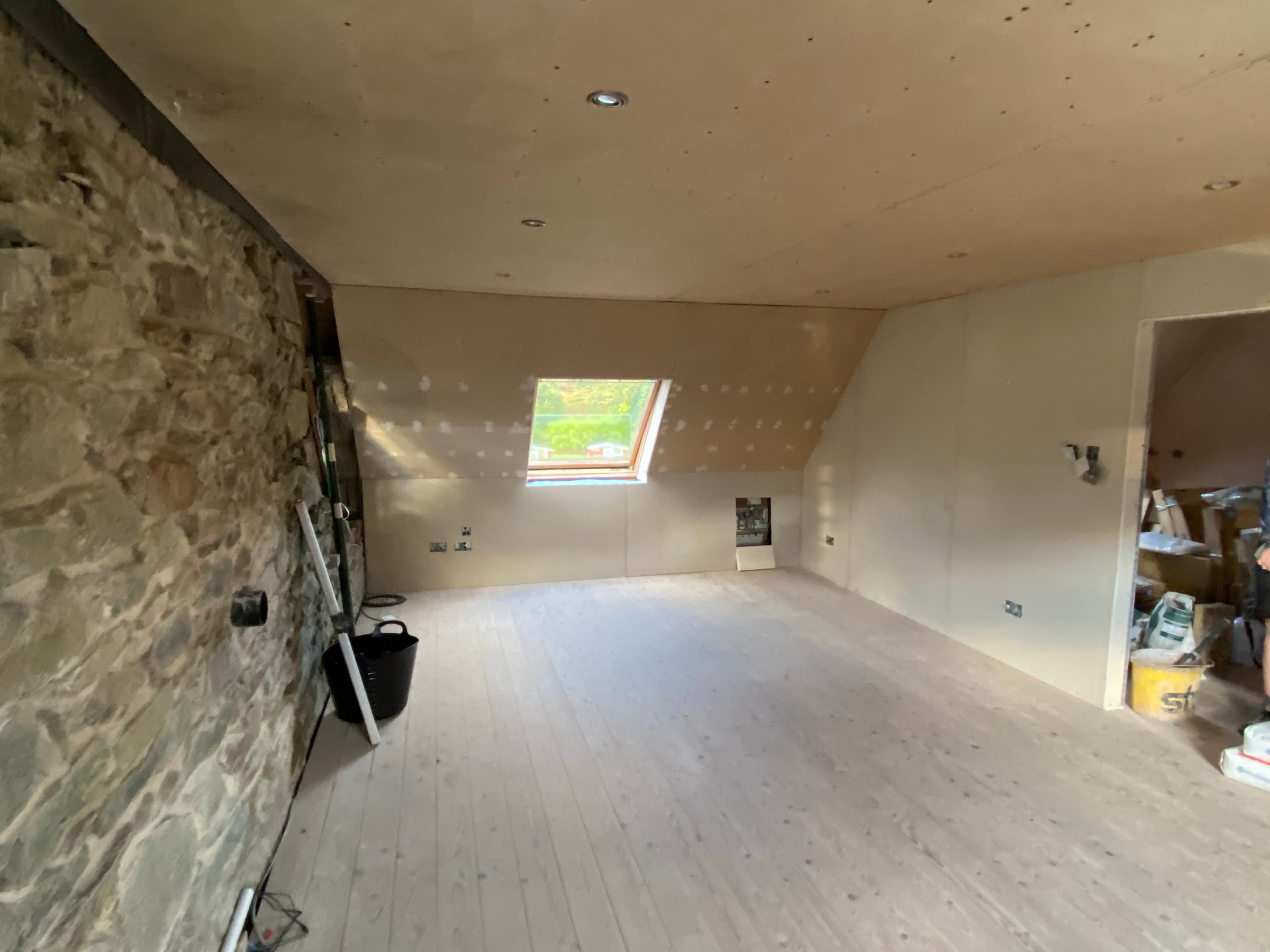 Wall plastering around a window reveal